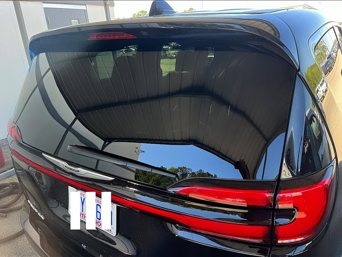 Windshield replacement installation in progress