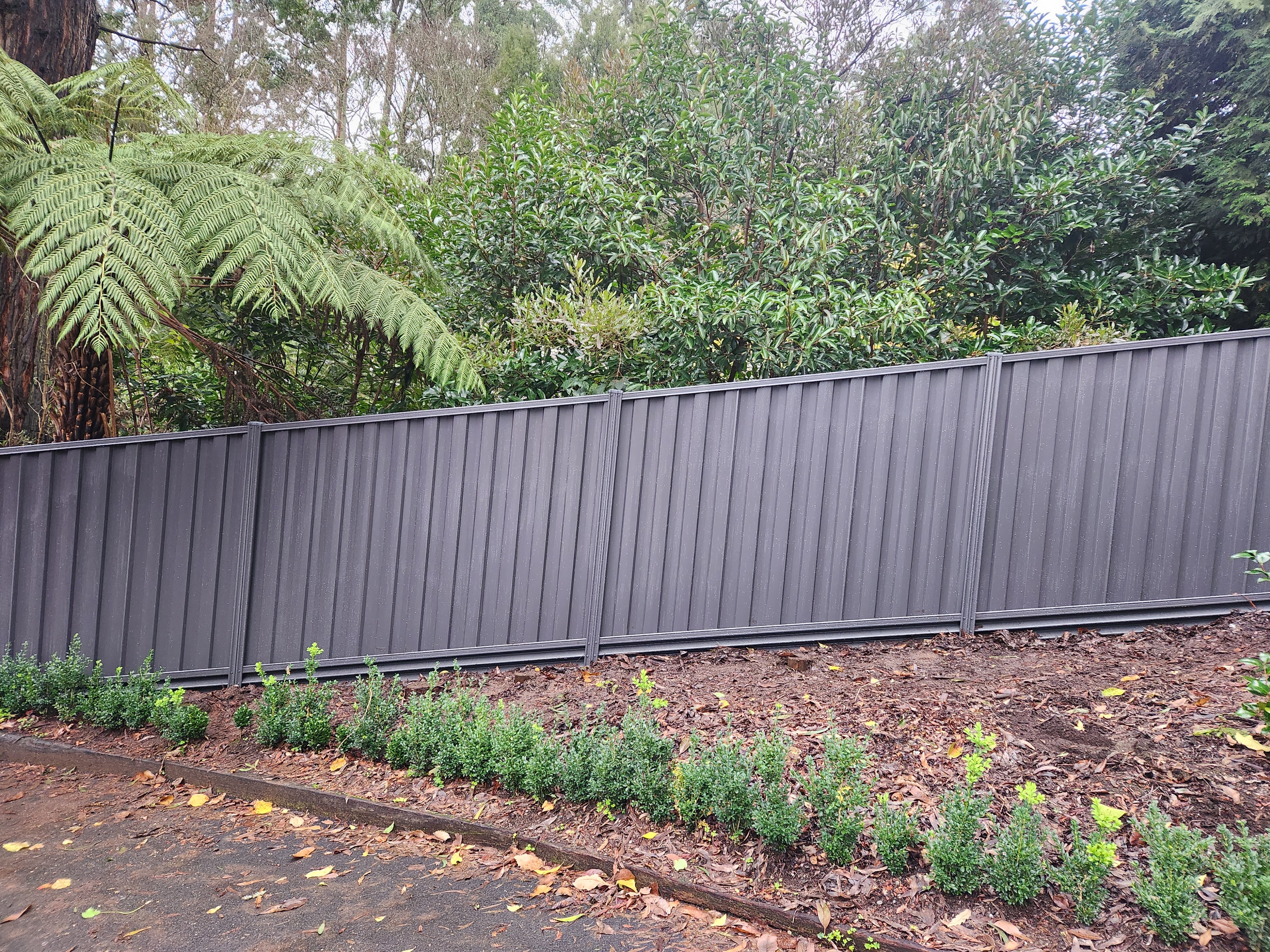 Aluminium slat fencing along a residential front boundary