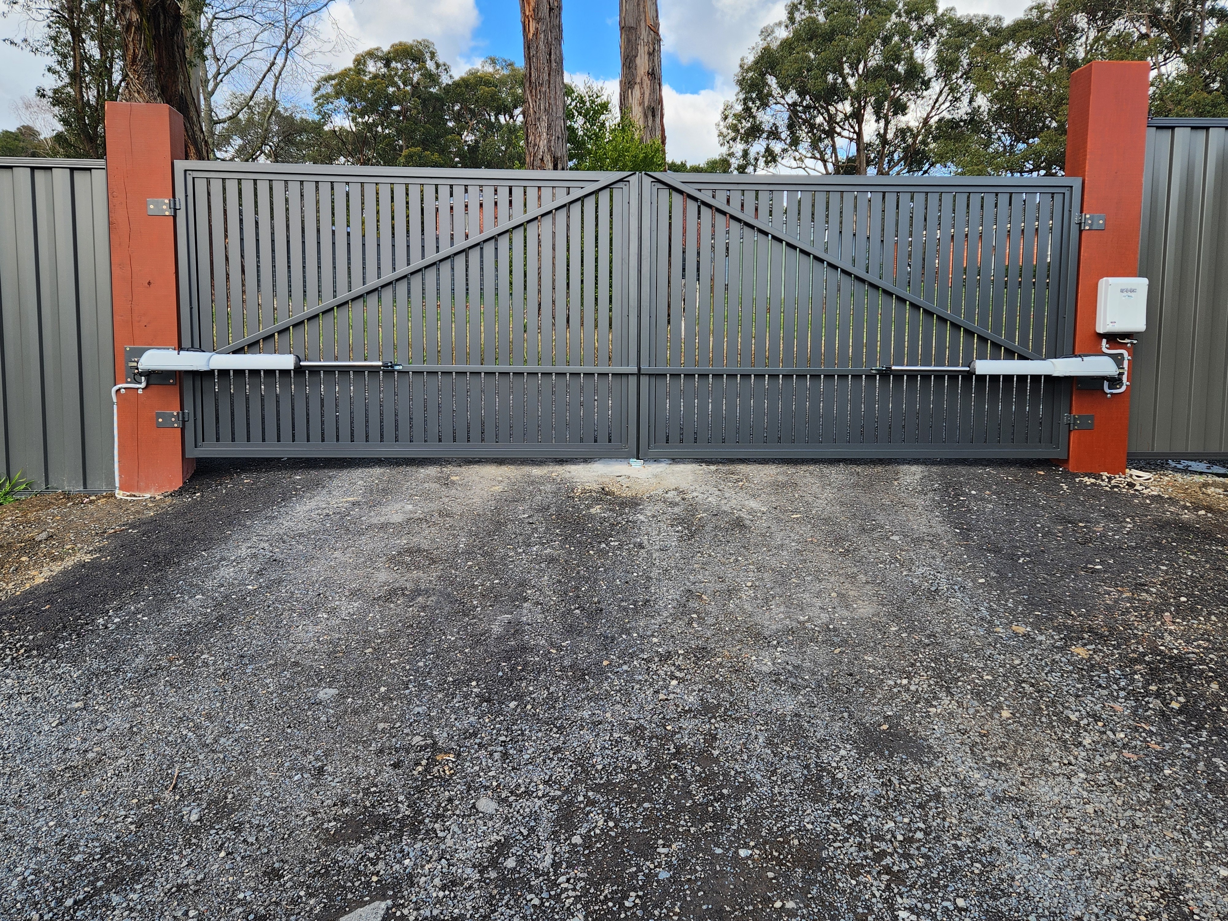 Custom gate complementing a home entrance